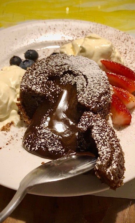Image: Delicious Chocolate Molten Lava Cakes served with a scoop of vanilla ice cream