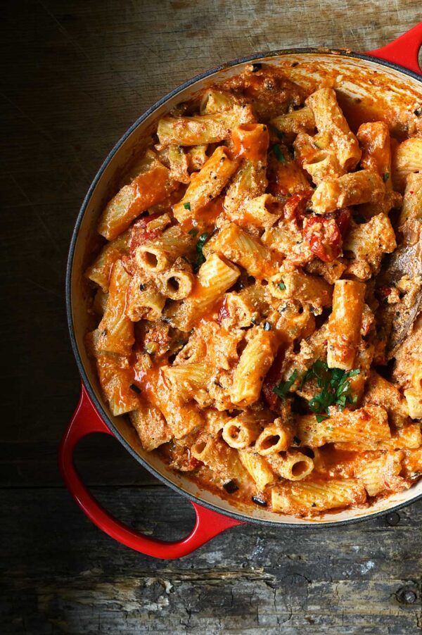 Creamy pasta with ricotta, sun-dried tomatoes, and eggplant in a savory sauce